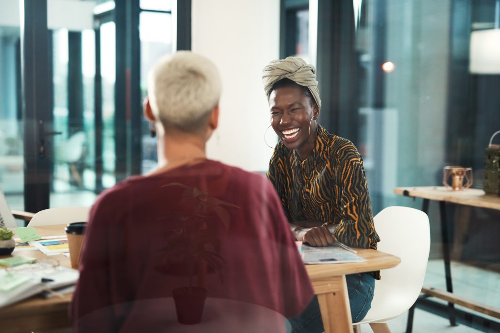 One on one meeting with two workers.