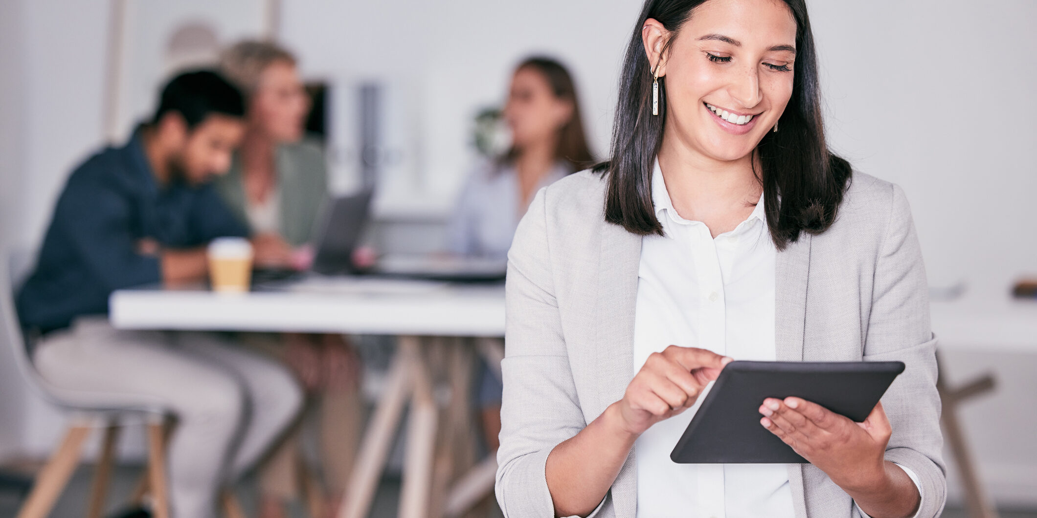 Woman working towards creating an inclusive work environment for her employees.