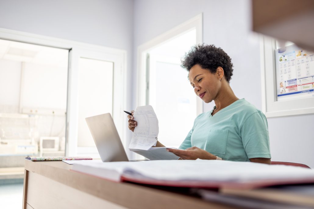 Woman filing paperwork