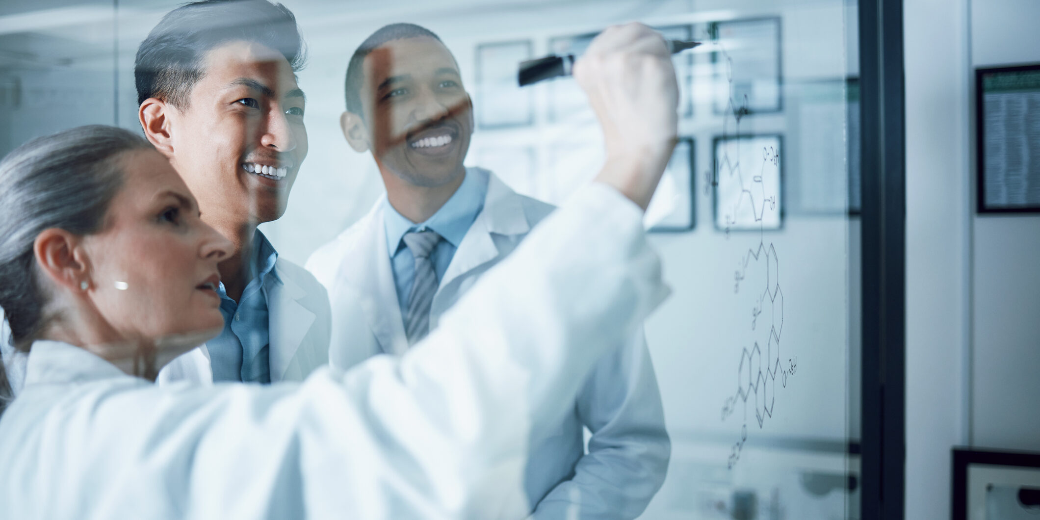 Teamwork, science and writing with people in laboratory for medical, research and planning. Pharmacy, healthcare and medicine with scientist and brainstorming for chemistry, solution and vaccine