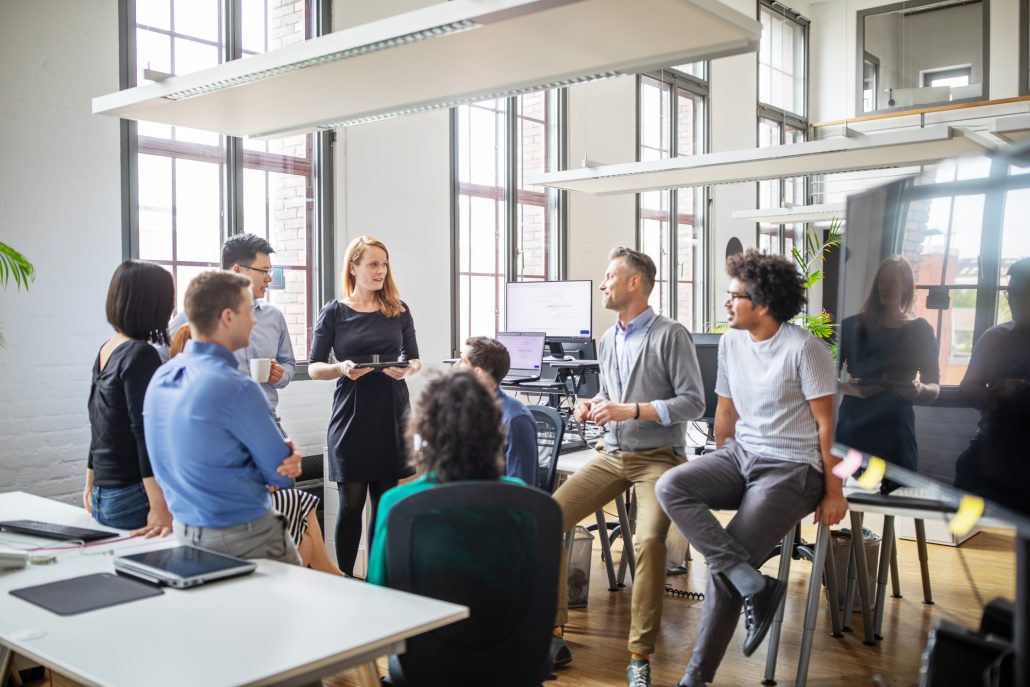 Discussing open enrollment with employees.