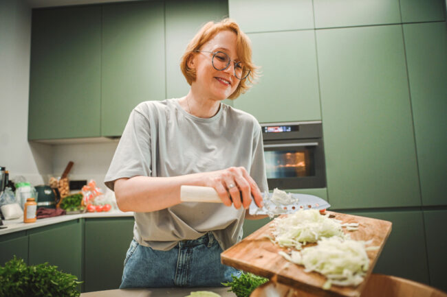 woman chopping onions